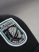 Black / Teal Project 1509 Trucker